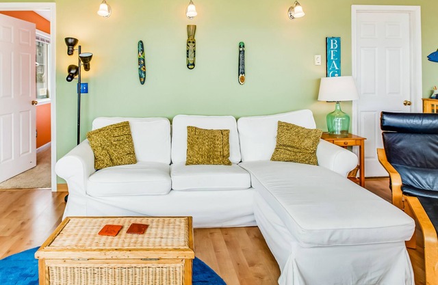 Dog-friendly home with ocean views and fireplace, walk to beach