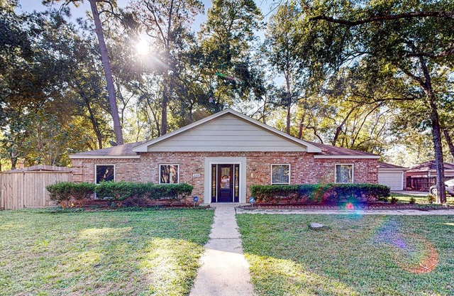 Dog-friendly home with large yard, firepit, home office, fireplace, & AC
