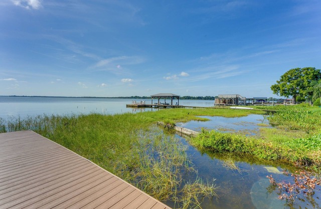 Dora Canal Views & Shared Dock: Apt in Tavares!