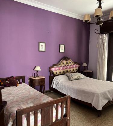 Dormitorio en casa de familia