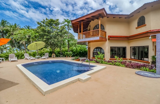 Dreamy Tropical Escape W/Fast WiFi, Beach Access, Private Pool, AC & Balcony