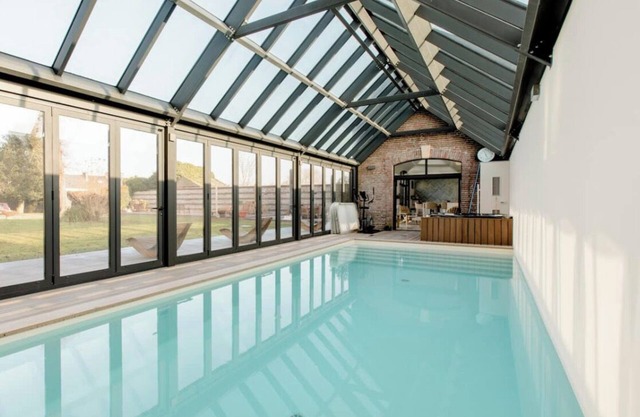 Ecurie les Tourelles indoor swimming pool & spa in Normandy
