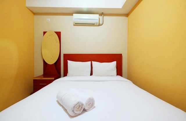 Elegant and Spacious 2BR Metropark Condominium Jababeka Apartment By Travelio