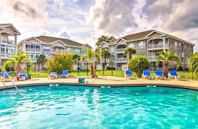 Endless Summer Updated Condo at Magnolia Place - Pool & Golf Course Views!
