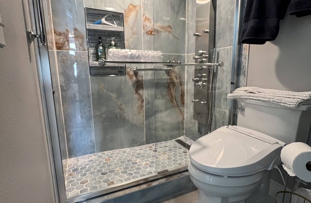 Enjoy inside and out! One step to sand and back to a shower tower or a Jacuzzi