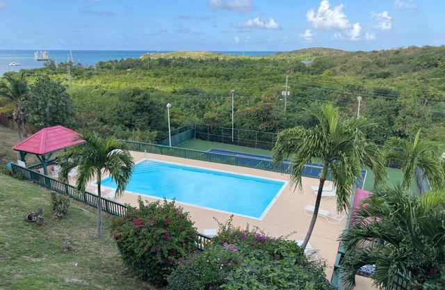 Enjoy Ocean Views and Caribbean Breezes From This Property!