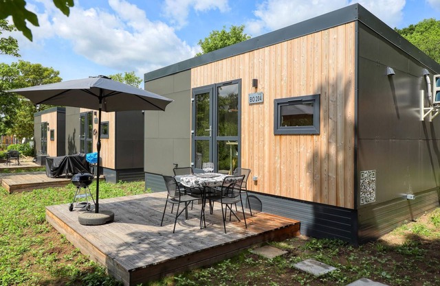 Experience a real Tiny House vacation close to nature at Camping Park Wemding!