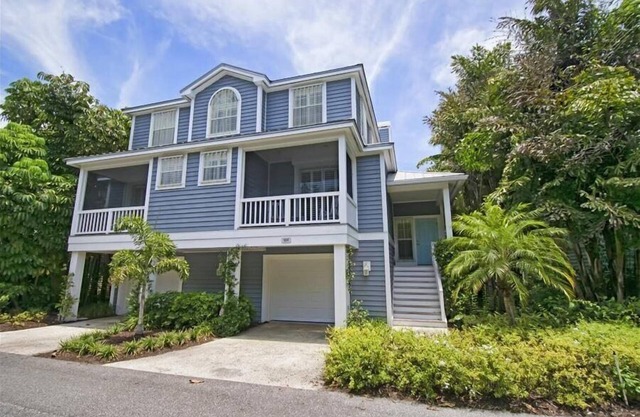 Experience luxury at B-505 Buttonwood, a spacious 4-bedroom, 3-bathroom home in Boca Bay