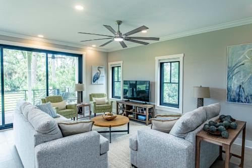 Experience Modern Coastal Living in this Beautifully Designed 4-Bed, 4-Bath Home