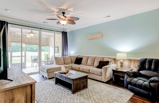 Fairway-view condo with screened porch, AC, W/D, pool, hot tub, & tennis