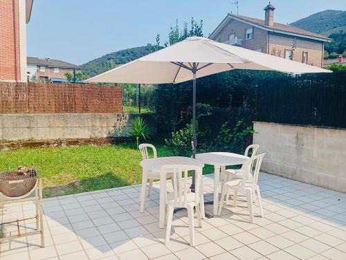 Familiar bajo con jardín en Gibaja