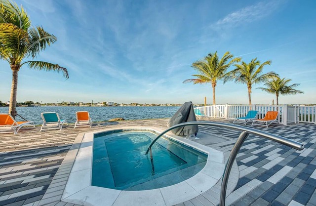 Family Friendly Waterfront Retreat! 3 Modern Suites w/Pool & Free Parking!