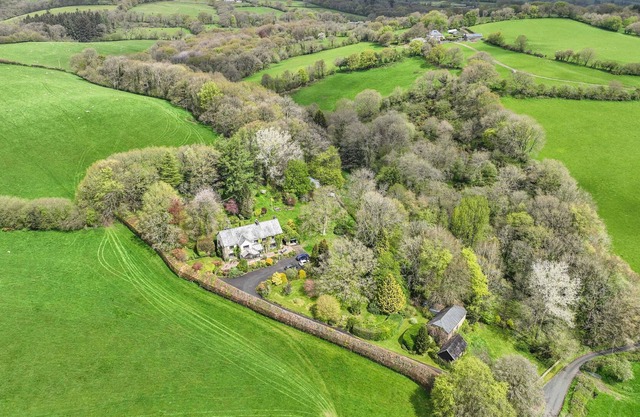 Family home in 10 acres private garden/woodland. Great for walkers and wildlife.