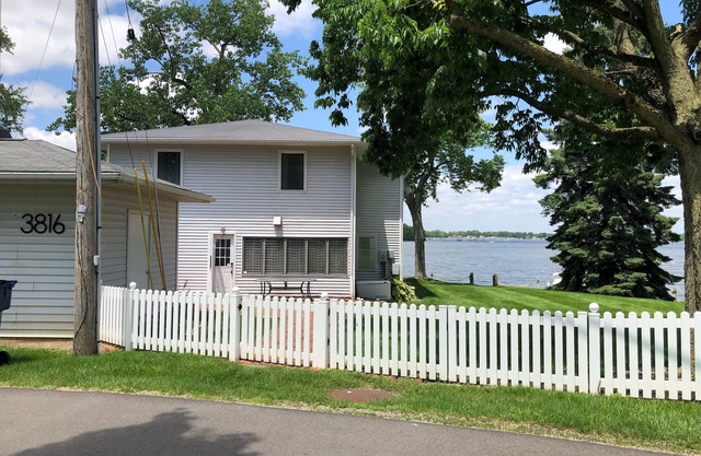 Family Waterfront Lakehouse with Large Side Yard and Picture Perfect Sunsets!