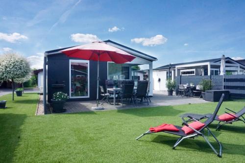 Ferienhaus Ufergeheimnis am Gülser Moselbogen I 2 SZ I 5 Gäste I Badebucht I Grill I Garten
