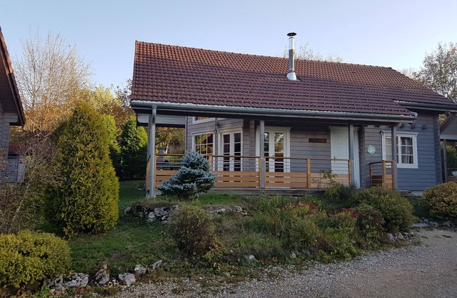 .finnish chalet with sauna entrance to haut jura nature park, open countryside