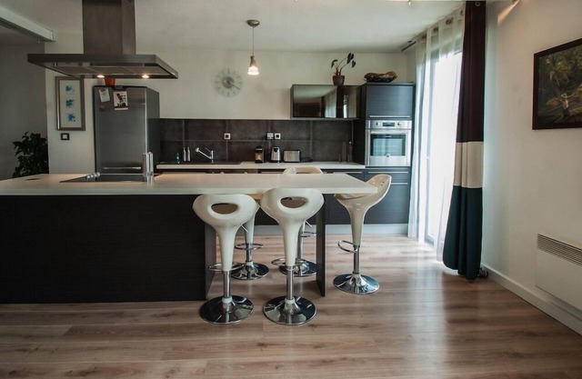 FLAMBERE - 80m2 - 2 chambres + parking + terrasse