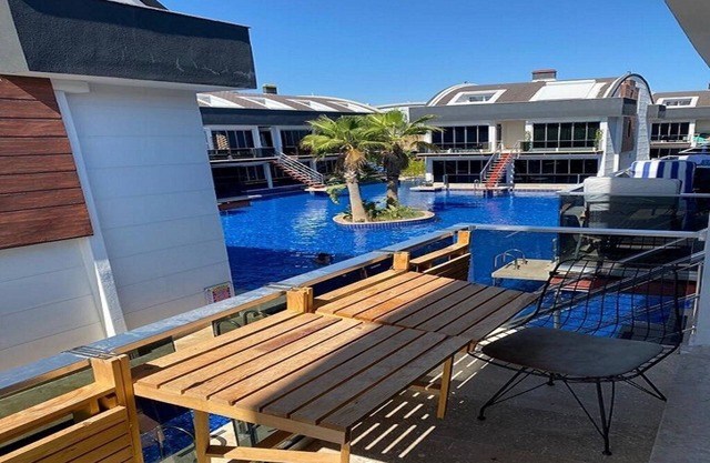 Flat closer to sea with big swimming pool .