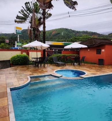 Flat em Juquehy - Condomínio com portaria e com piscina próximo praia