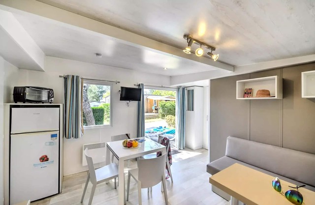 Flower Camping Les Ondines * - Mobil-Home Bois Premium 30m2 2 bedrooms + semi-covered terrace + TV + CLIM 5 people