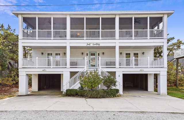 Free Golf at Bear Trap Dunes and MORE! NEW LISTING 2020! DOG FRIENDLY! Exceptional vacation home located just steps from the beach
