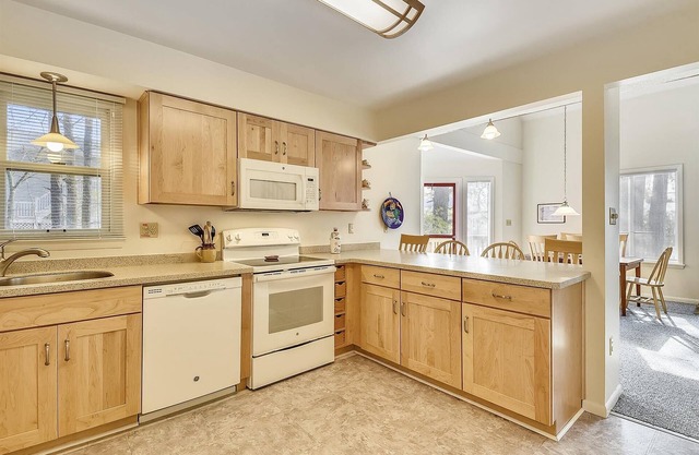 Free Golf at Bear Trap Dunes and MORE! Bright and cheery house only a short walk to the beach! Some features include 3 bedrooms plus den, 2 baths