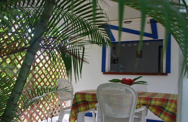 Friendly cottage in tropical garden