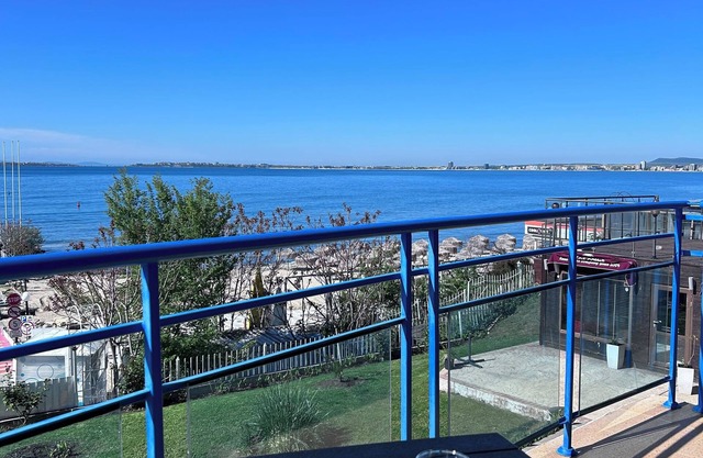 Frontline-beach 40m. Large airy appt. Balconies overlooking beach, sea & marina