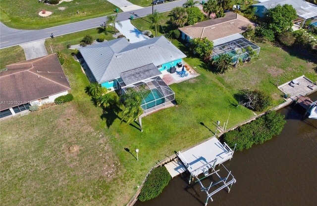 'Fully Updated and New' Waterfront Pool home with boat lift in paradise