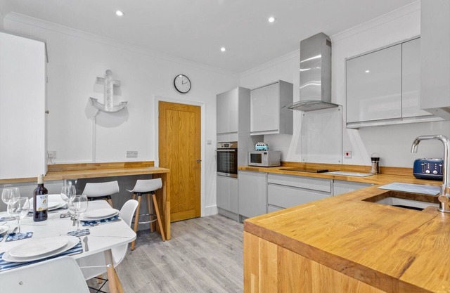Garden apartment with parking seconds from beach!