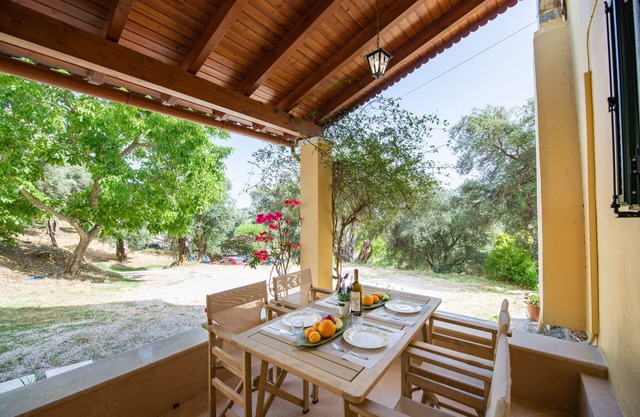 Green Walnut Home in Ano Korakiana is surrounded by nature on a quiet area.