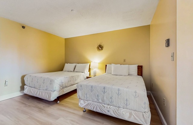 Ground Level Condo with Shared Pool, Firepit, Free WiFi, and Partial A/C