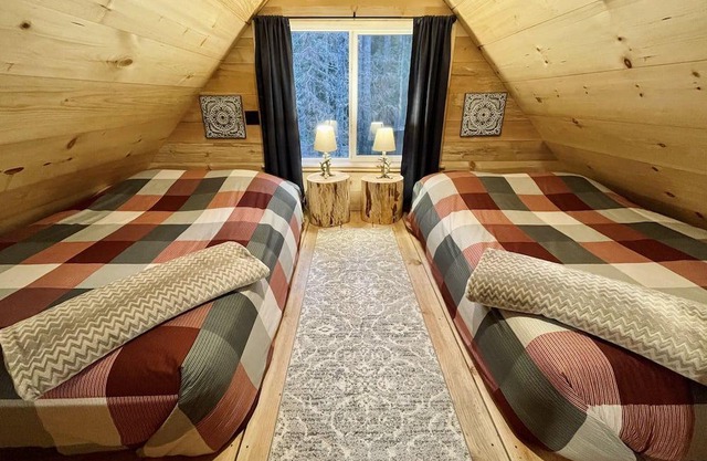 Hand built, pet friendly & nestled in the woods.