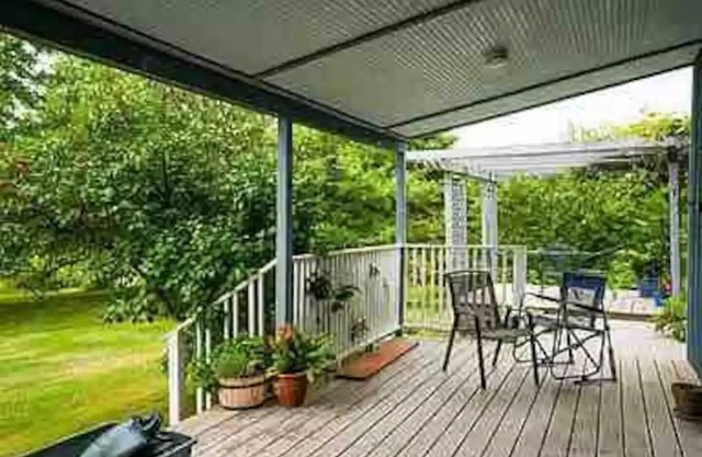 Hill top home located on 30 acres with privacy and surrounding natural beauty.