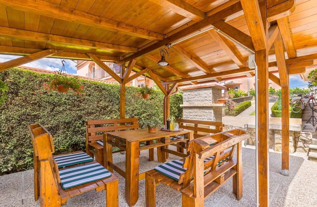 Holiday apartment with garden and sauna