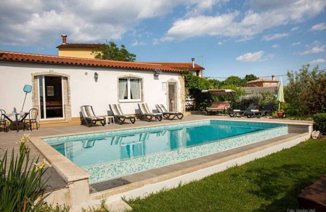 Holiday apartment with outdoor swimming pool and terrace