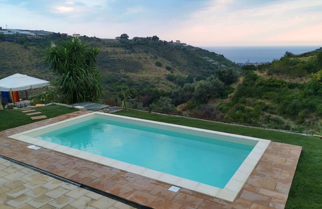 Holiday Home "Angolo dei Fiori" with Sea View, Shared Pool & Air Conditioning