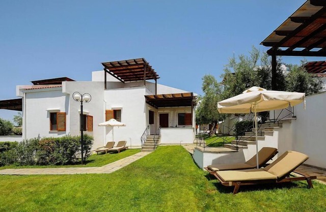 Holiday home in Gerakini with a balcony or terrace