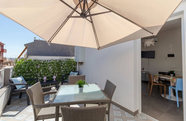 Holiday Home "La Dimora della Luna" with Sea View, Terrace & Wi-Fi