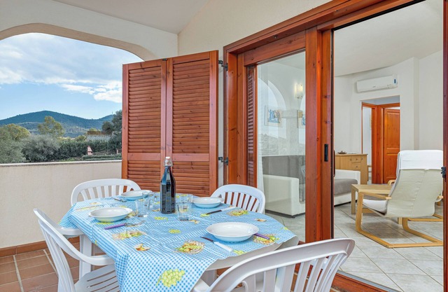 Holiday Home 'Trilocale Con Vista Tavolara' with Mountain View, Private Terrace and Air Conditioning