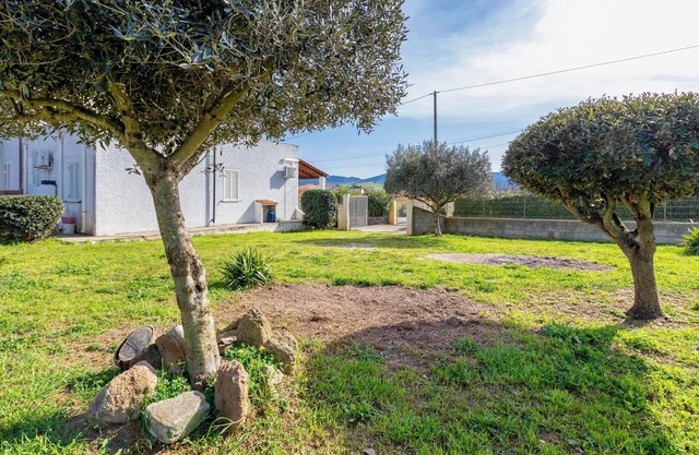 Holiday Home 'Villetta I Pitosfori' with Terrace, Garden & Wi-Fi