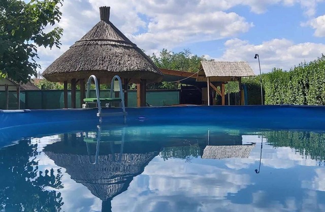 Holiday home with outdoor pool, air conditioning and WiFi