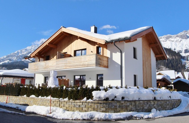 Holiday home with wood stove, sauna and garden