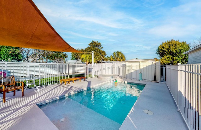 Home with pool, central AC, & washer/dryer - walk minutes to beach
