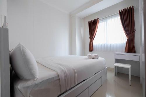 Homey 2BR Signature Park Grande Apartment By Travelio