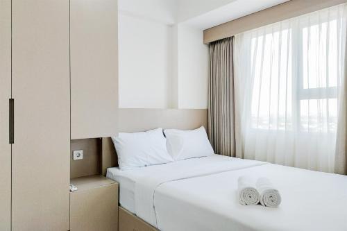 Homey and Modern 2BR at Loftvilles City Apartment By Travelio