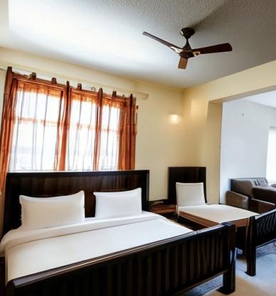 Hotel Abedrooms- Budget stay Thanjavur