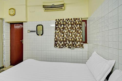 Hotel O Dream Palace Guest House Near Marina Beach