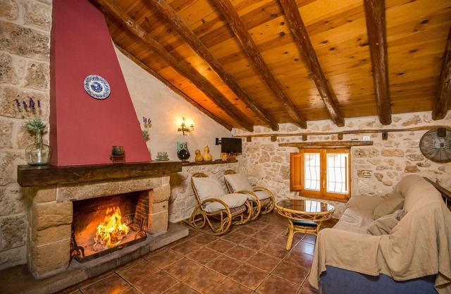 House Ana III. Attic terrace and fireplace