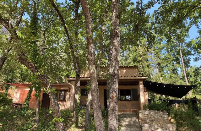 House in an estate with swimming pools, tennis, river